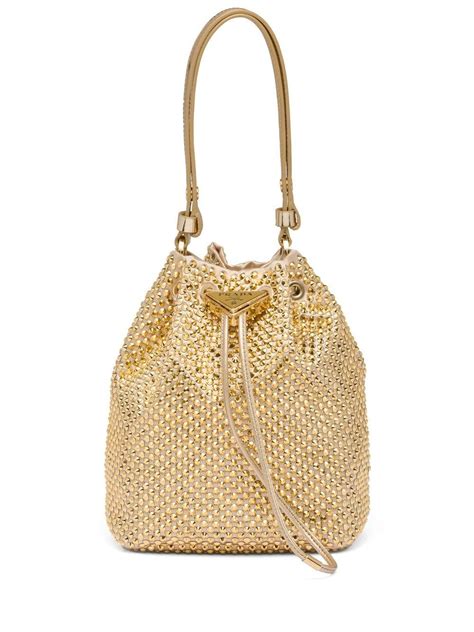 Gold Tone Crystal Embellished Bucket Bag .